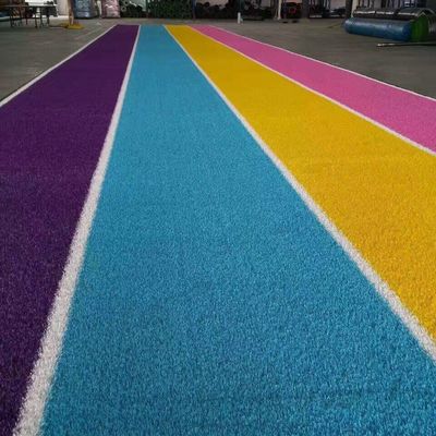دکوراسیون باغچه زمین بازی چمن تقلبی رنگی